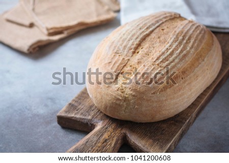 Freshly baked bread from leaven, with copy space. Organic Bread. Selective focus