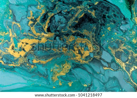 Marble abstract acrylic background. Nature green marbling artwork texture. Golden glitter. Royalty-Free Stock Photo #1041218497