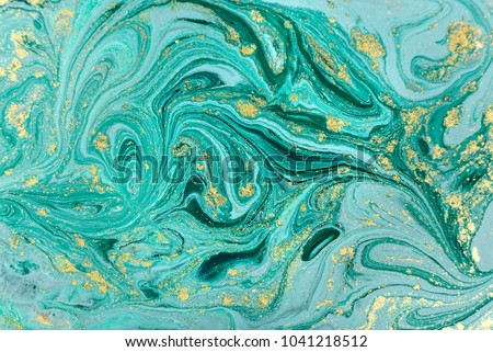 Marble abstract acrylic background. Nature green marbling artwork texture. Golden glitter. Royalty-Free Stock Photo #1041218512