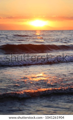 Beautiful sea sunset at the sea photographed in close-up