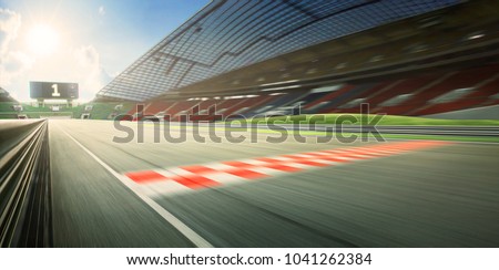 Sunrise motion blur effect asphalt international race track with Royalty-Free Stock Photo #1041262384