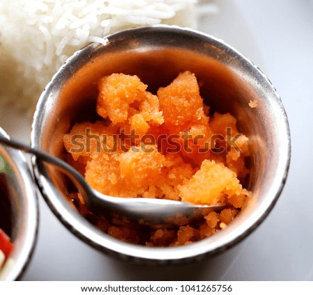 Tasty Indian food in bowl take close up picture