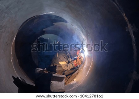 The welder weld root weld from inside of the housing of  chemical apparatus