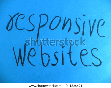 Text responsive websites hand written by black oil pastel on blue color paper
