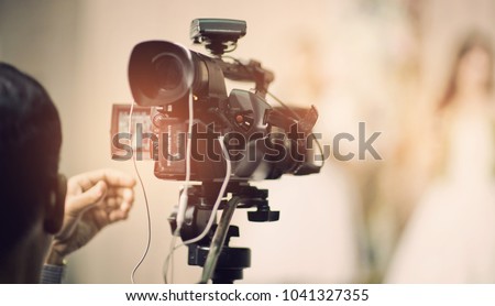videographer, professional camera, man with camera
