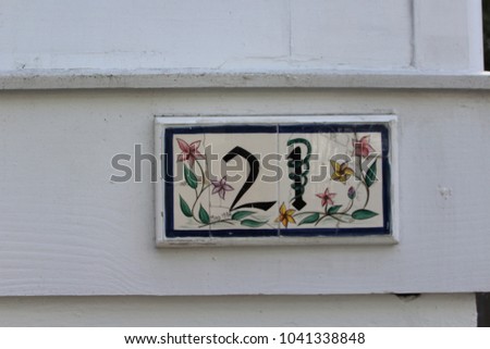 House number tile sign in downtown historic Charleston, South Carolina