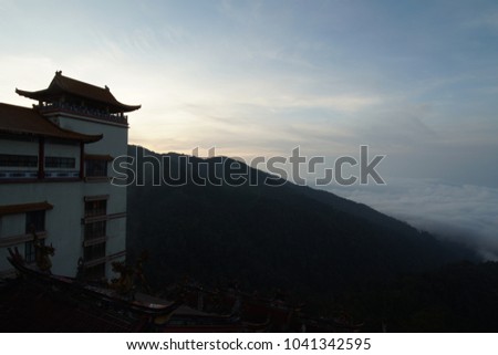 Breathtaking rolling clouds scene at Chin Swee Caves Temple, Genting Highlands, Pahang. Aerial view or high angle view.