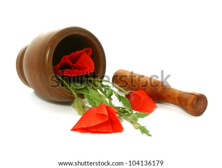 mortar and poppies isolated on white background