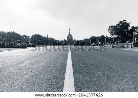 Main gate of Rashtrapati Bhavan located in New Delhi, Delhi, India. Rajpath is the most efficiently built road in the country. This road connects India Gate war memorial & Rashtrapati Bhavan of India. Royalty-Free Stock Photo #1041397426