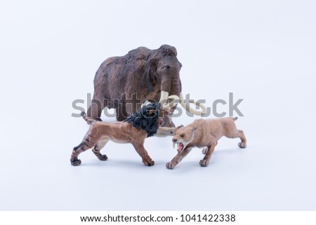 Smilodon saber-toothed roaring and attacking Big tusks Brown Mammoth toy