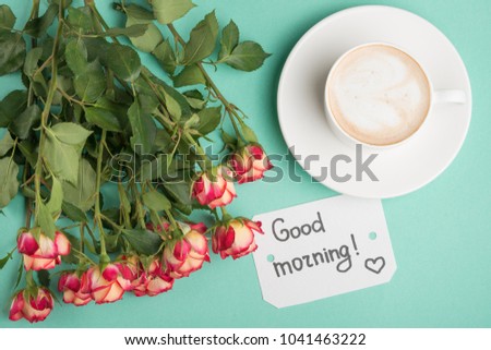 coffee with roses on a light background