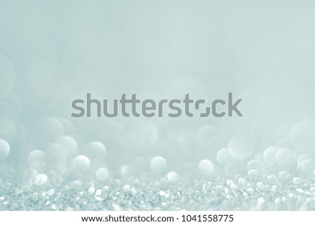 silver and white abstract glitter background with bokeh defocused lights christmas