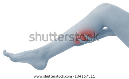 Pain in a woman calf. Female holding hand to spot of  calf-aches. Concept photo with Color Enhanced blue skin with read spot indicating location of the pain. Isolation on a white background.