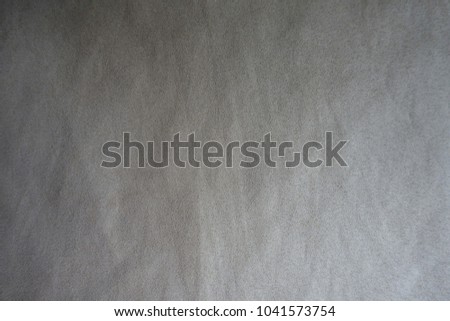 Pale warm grey napped fabric from above