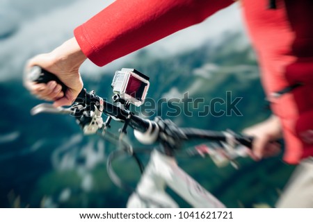 Action Camera Mounted On Mountain Bike Royalty-Free Stock Photo #1041621721