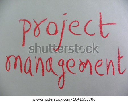 Text project management hand written by red oil pastel on white color paper