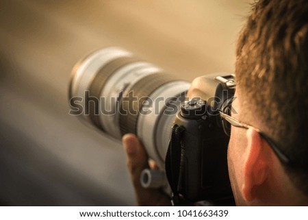 Photographer with camera