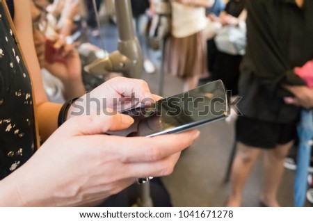 woman using cellphone, closeup image
