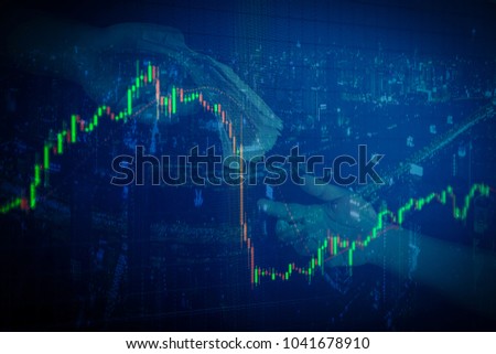 candlestick graph office building background , Business and financial concept