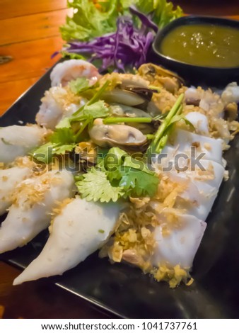 Steamed Seafood Combination, Focus on front picture, warm tone
