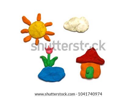 Colorful plasticine clay molded to house sun water flower cloud in nature isolated on white background with copy space for text. Creativity children toys concept.