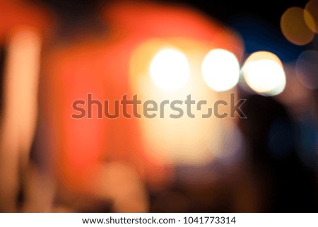 defocused lights of the street with bokeh abstract background, vintage retro filter