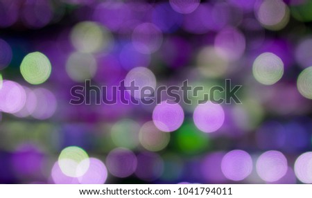 Abstract blurred glittering bulb light, ultraviolet blur bokeh light wallpaper decoration concept Ultra violet tone, color of 2018. Holiday festival backdrop, sparkle circle celebration backgroubd