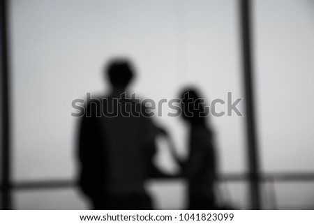 blur silhouette  Men and women standing together