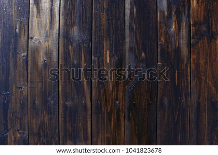 Old wooden background. Vintage texture. Dark wooden boards. Vintage pattern. Old grunge dark textured wooden background. Creative background. Old fence
