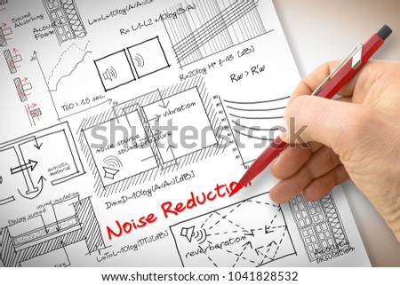 Engineer writing formulas about noise reduction in buildings - concept image
