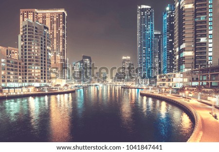 Dubai Marina at night, color toning applied, United Arab Emirates.