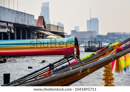 Bangkok, Thailand: closeup picture of a traditional boat on the Chao Phraya River 