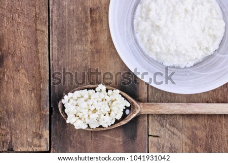 Fresh Kefir grains and whey. Kefir is one of the top health foods available providing powerful probiotics.  It is cultures of yeast and bacteria use to make a fermented milk product.