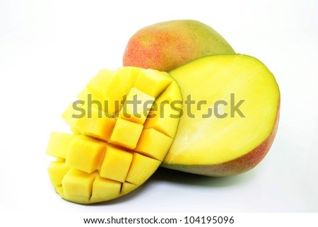 Fresh ripe mango (Mangifera indica) with a section cut in squares on a white background.