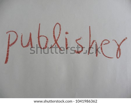 Text publisher hand written by brown oil pastel on white color paper