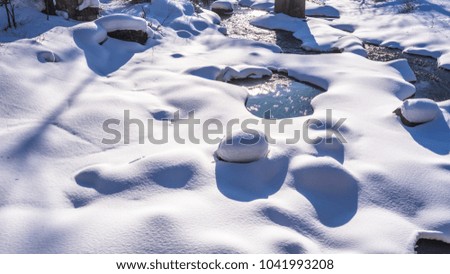 Natural winter background with snow drifts