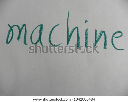 Text machine hand written by green oil pastel on white color paper