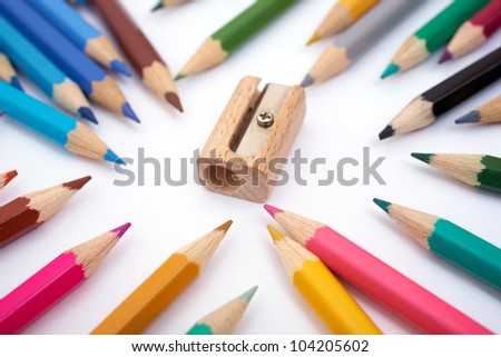 Image of sharpening surrounded by color pencils