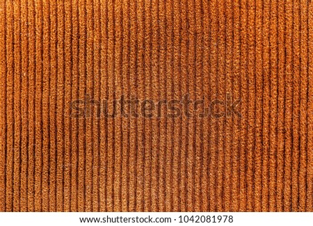 Background texture of brown velvet surface, close up picture