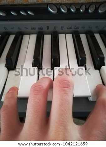 Music lesson on the piano