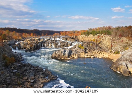 Scenic view of waterfalls in Great Falls Park in Virginia on a sunny during fall season