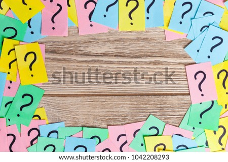 colorful question marks frame background written reminders tickets. ask or business concept with copy space.