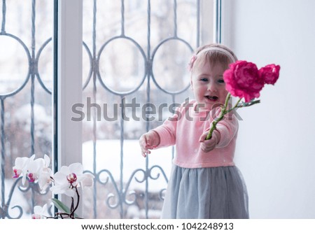 Little girl with flower