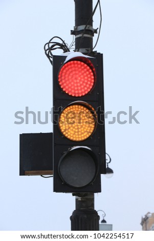 red and yellow signal at the traffic light
