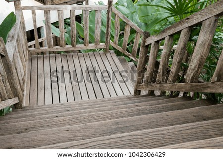 Old wooden walkway in jungle resort, shallow depth of field
