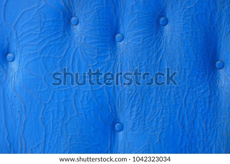 blue leather texture from a piece of old plating with cracks