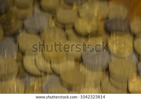 Abstract background concept of unfocused ukrainian coins