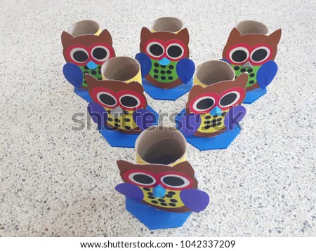 Owl vases are made of cardboard