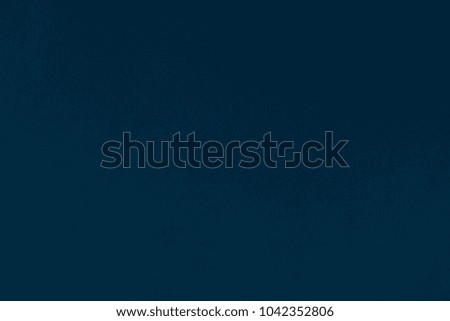 Paper texture dark blue color of the background