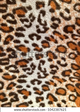 Background wallpaper art abstract textures Tiger pattern vintage Royalty-Free Stock Photo #1042387621